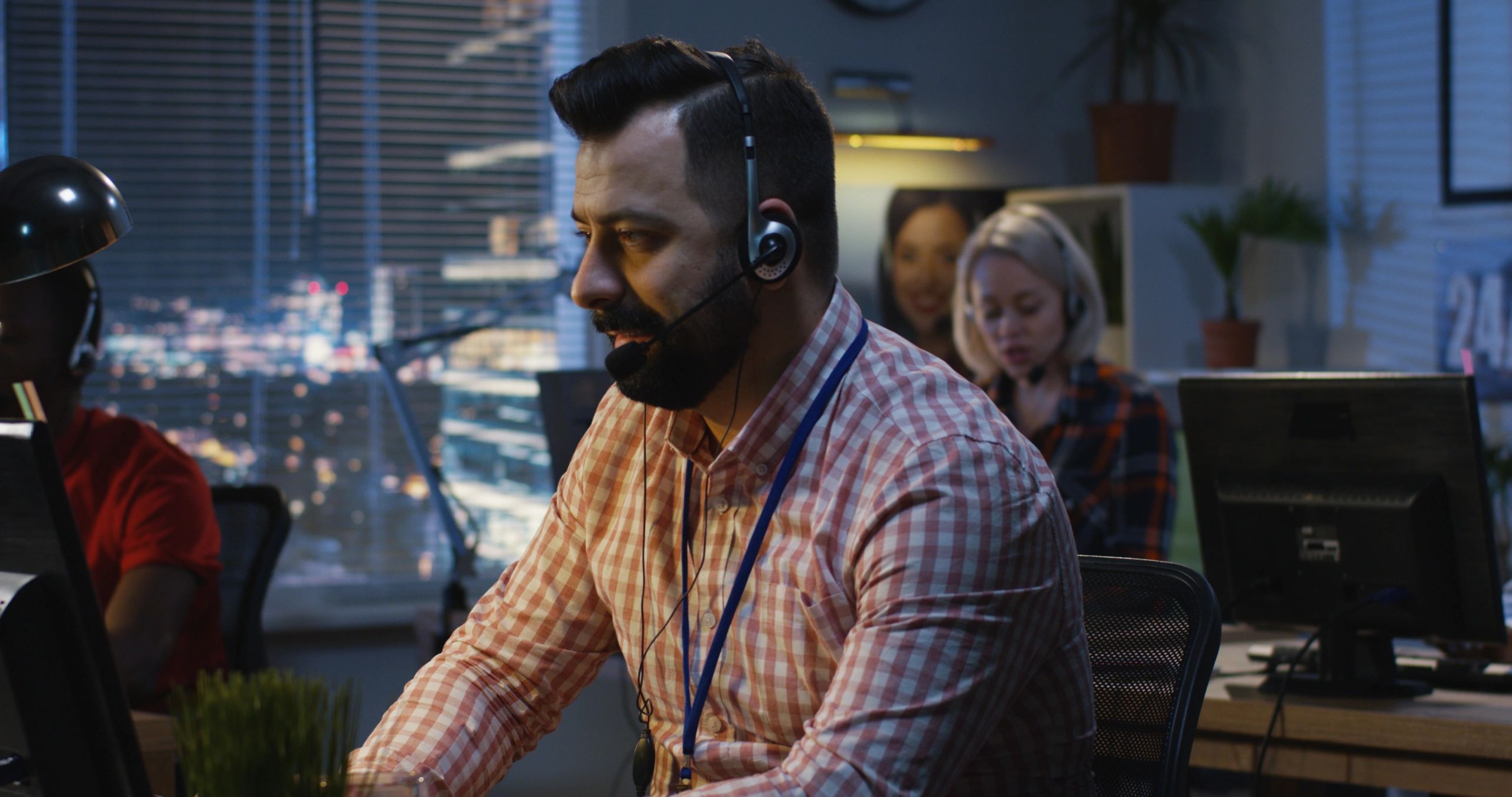 Transportation support staff working in an operations office