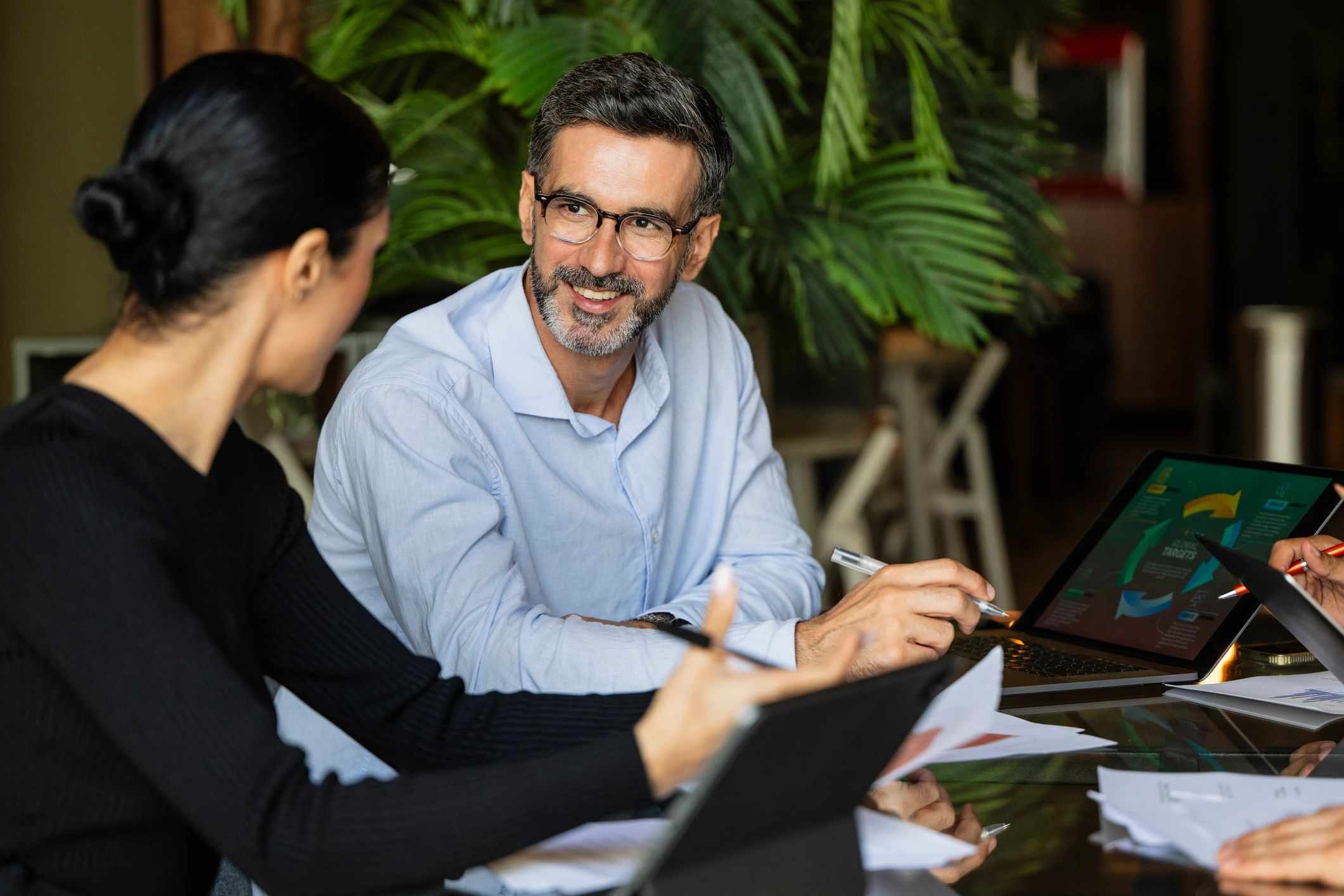 Business professionals discussing continuity planning