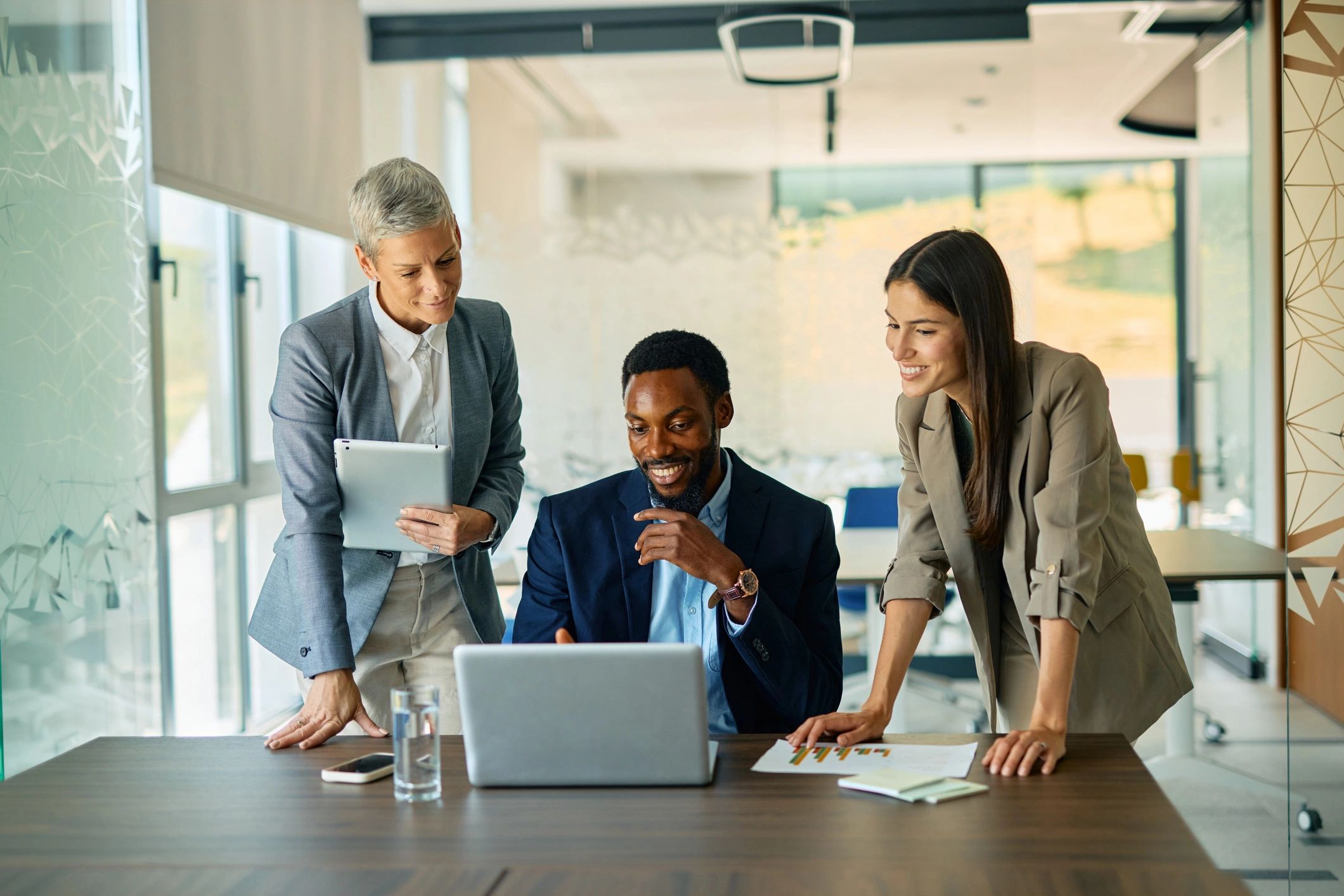 Business professionals meeting to discuss liability and risk management