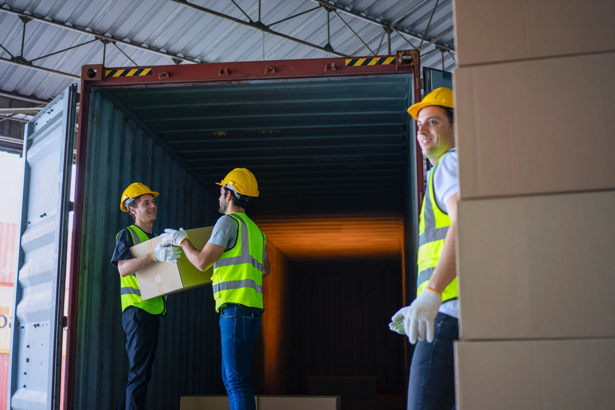 Warehouse employees working in a logistics facility