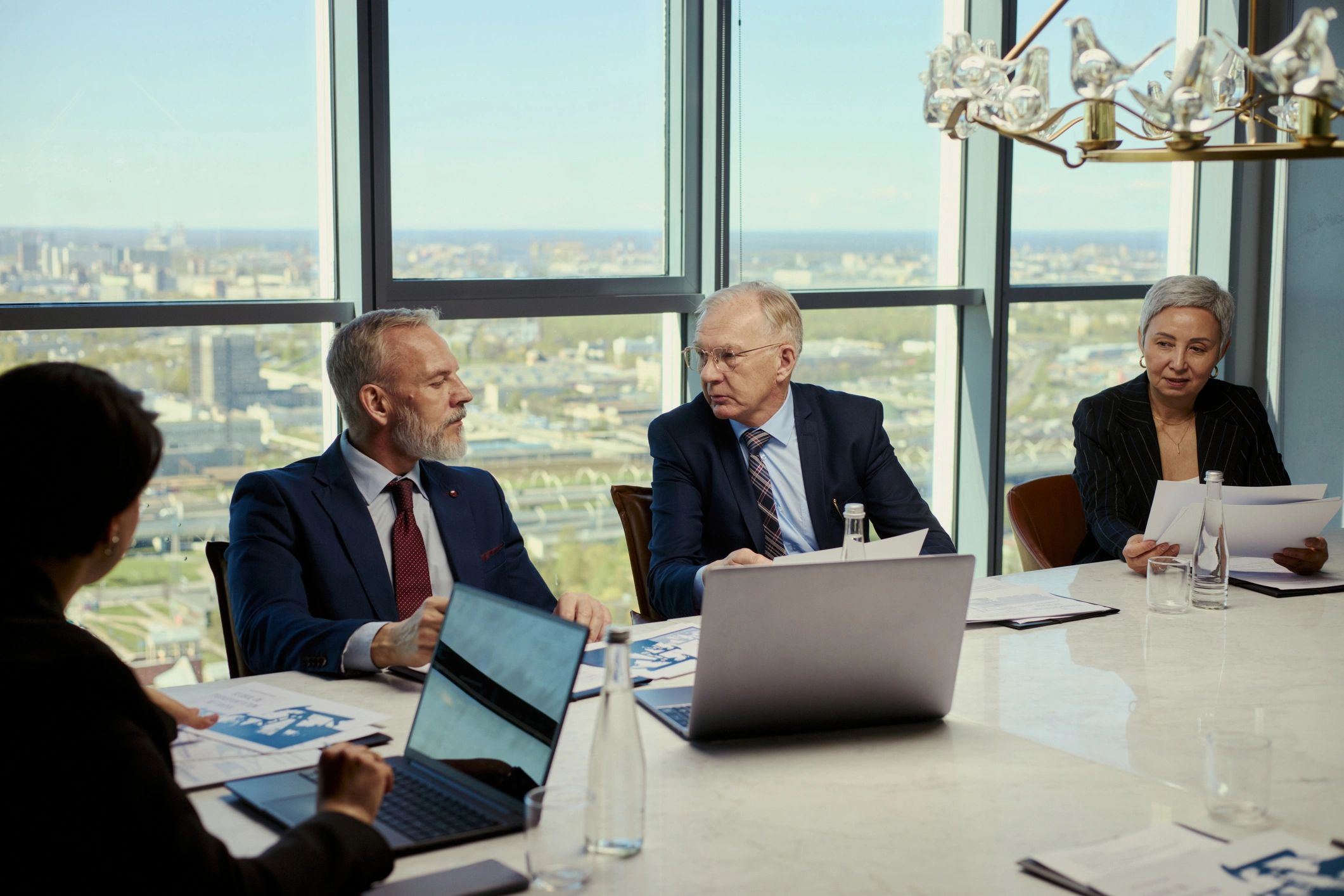 Business executives reviewing strategy in a boardroom